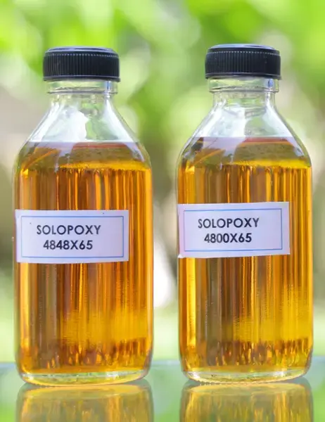 SOLOPOXY single pack epoxy resins - two bottles of amber-colored JMN Series resins labeled 4848X65 and 4800X65